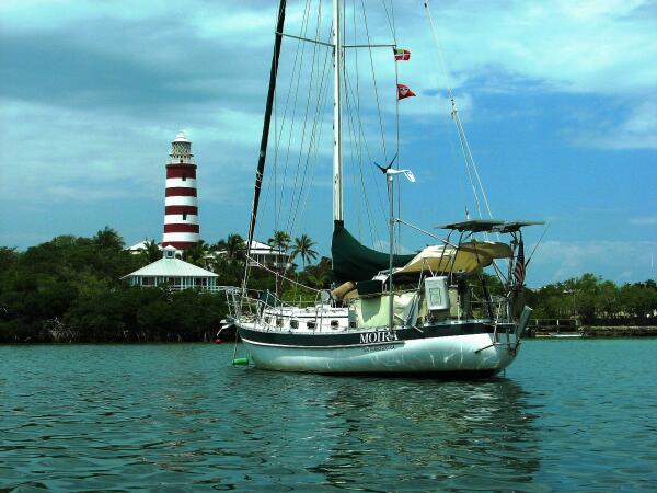 Moira in Hopetown Harbour with Lighthouse