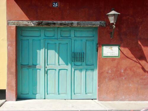 Posada del Angel carriage door, pedestrian door, and Judas hole