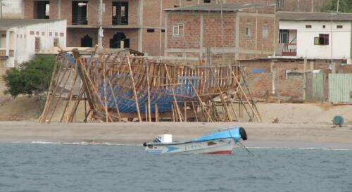 Fishing vessel under construction on the beach, Ayanque, Ecuador