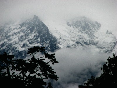Snowy Andes at Ollantetambotrain station on way to Machu Picchu, Peru